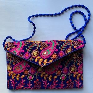 Hand-embroidered clutch bag